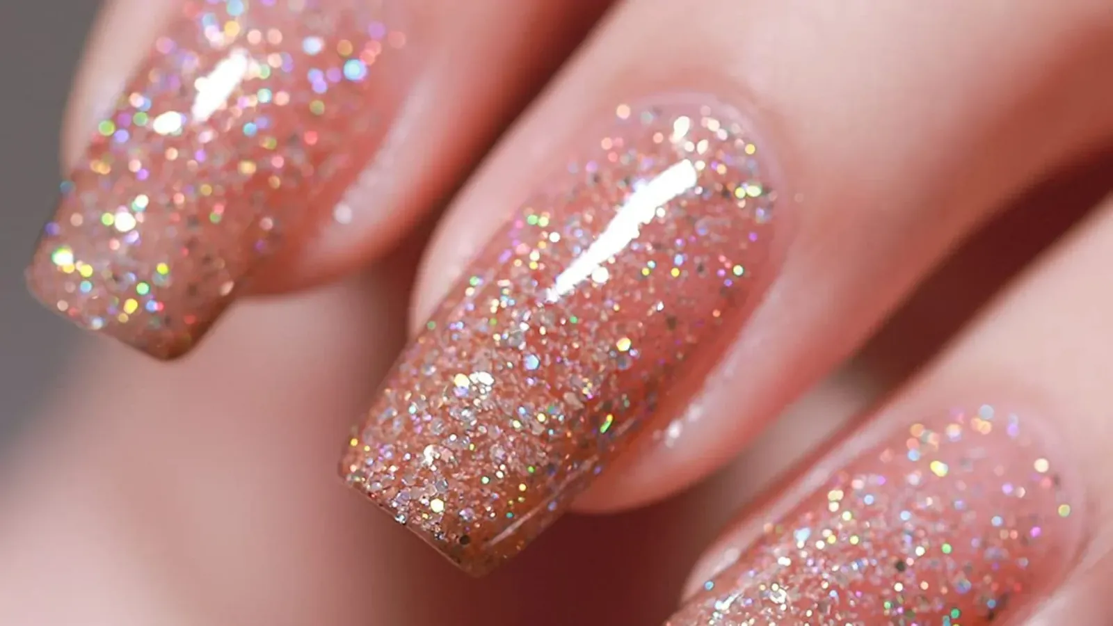 Coffin-shaped nails with pink and silver glitter